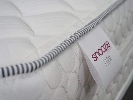 Snooze-Firm-corner-and-label